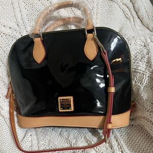 Chic Dooney and Bourke satchel with patent leather finish.